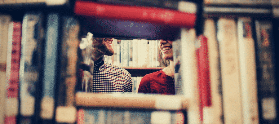 Couple smiling at bookstore