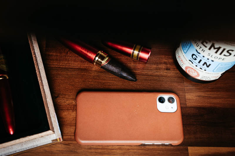 Anson Calder iphone case against wooden shelf