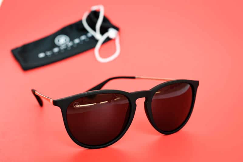 Blenders Eyewear university heights on red background sunglasses