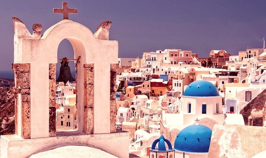 Blue domed churches from Oia on the greek isle of Santorini