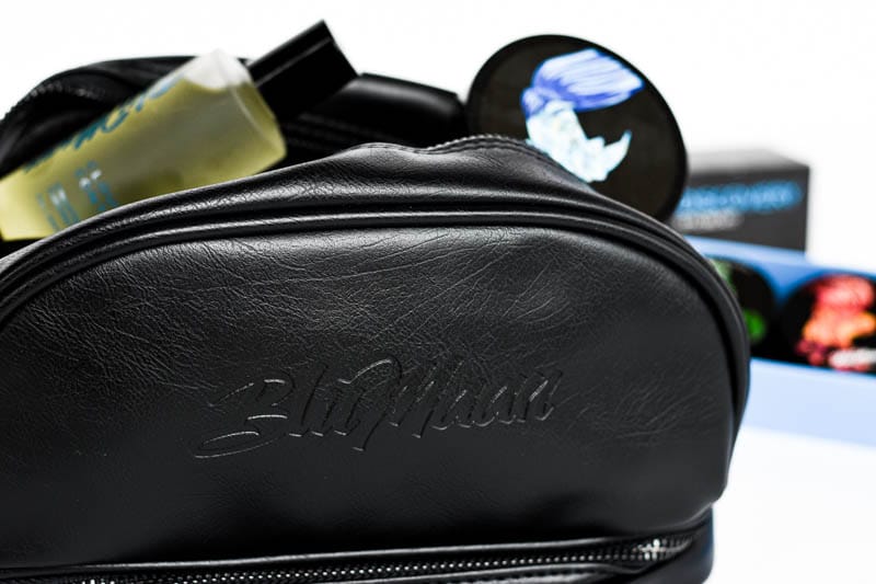 blumaan black leather dopp kit with hair styling products