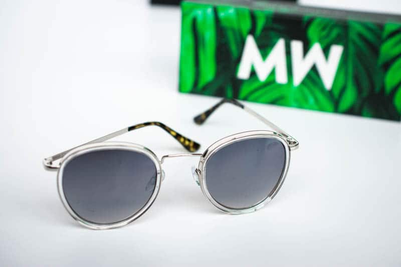 chrome shackleton messyweekend sunglasses with green case on white background