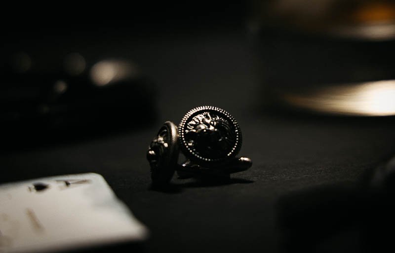 closeup of lions head cufflinks