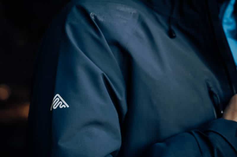 Cortazu logo on navy jacket