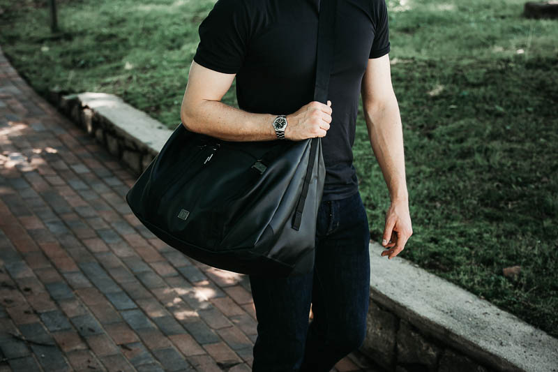 Db Bags Review: Adventure Awaits 17 Db Bags weekender bag on hip