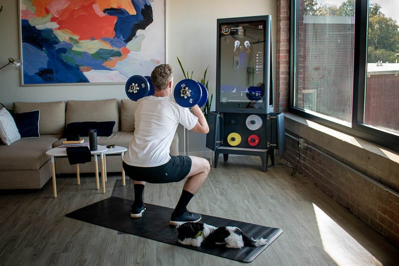 doing squats with the Tempo Studio