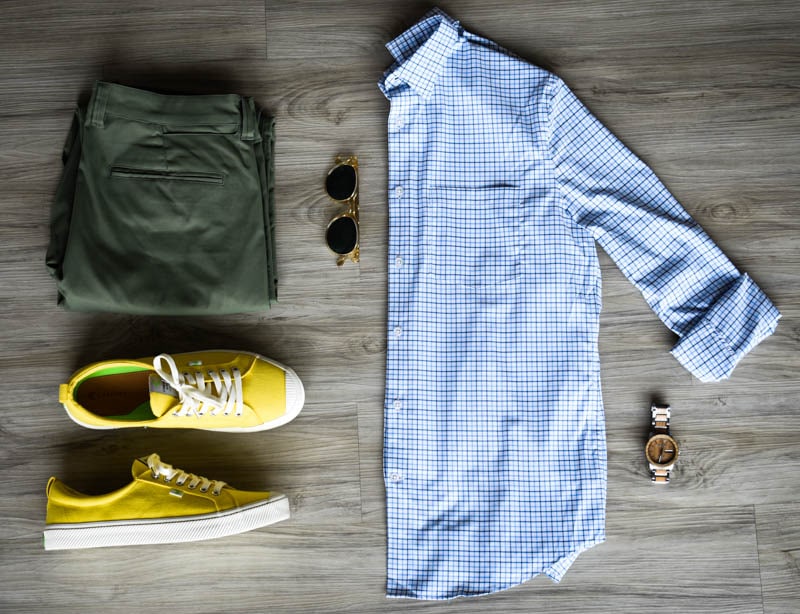 flatlay featuring bluffworks ascneder chinos meridiant shirt original grain watch cariuma sneakers messyweekend sunglasses