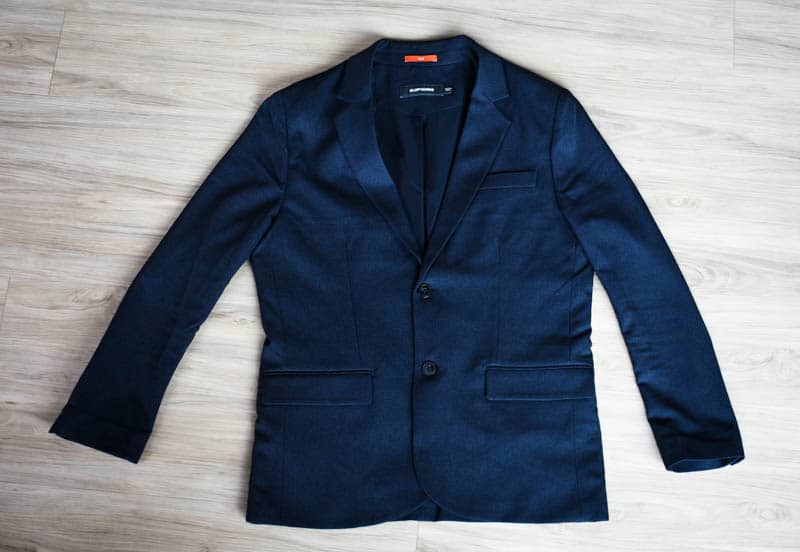 flatlay of navy gramercy blazer bluffworks