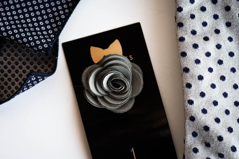 grey lapel flower