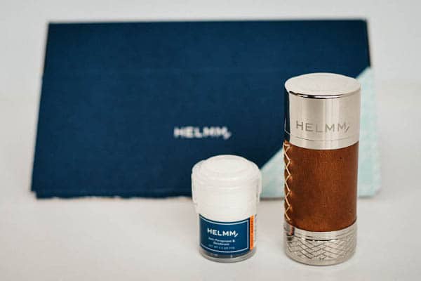 helmm applicator and nightmarket antiperspirant with packaging in background scaled 1