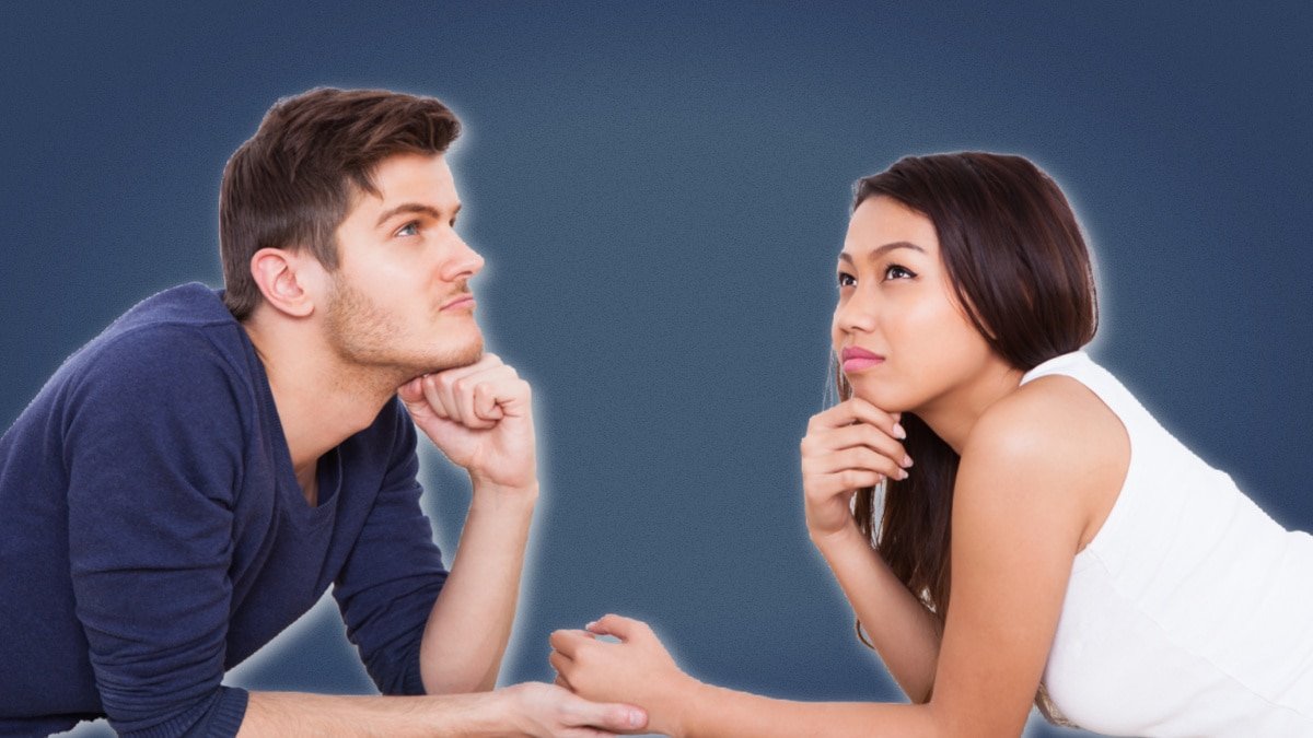 Hypothetical Questions Young Couple Deep in Thought While Lying on Floor