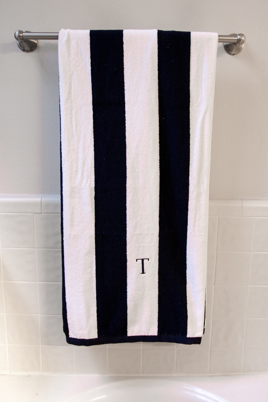 Luxor Linens Anatalya Egyptian Cotton Resort Beach Towel on towel rack