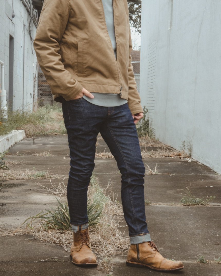 Male model showing off Everlane Skinny Fit Jean outdoors
