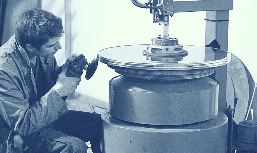 Man crafting round object