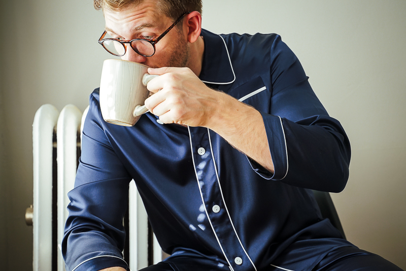Man drinking coffee in Lilysilk pajamas
