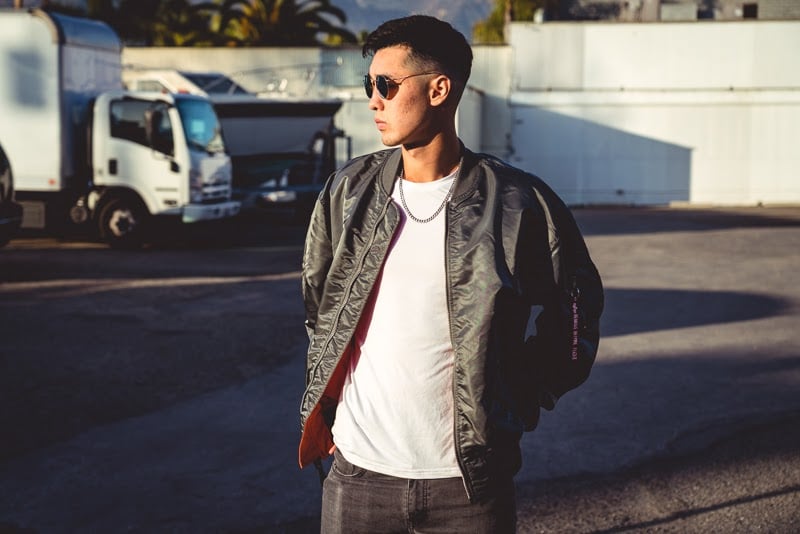 How Military Style Can Level Up Your Closet: The Complete Guide for Men 5 Man in grey bomber jacket outside
