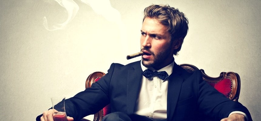 Man in suit in a cigar lounge