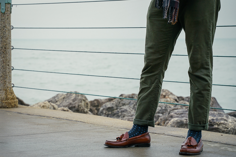 man wearing brown GH Bass loafers by lake