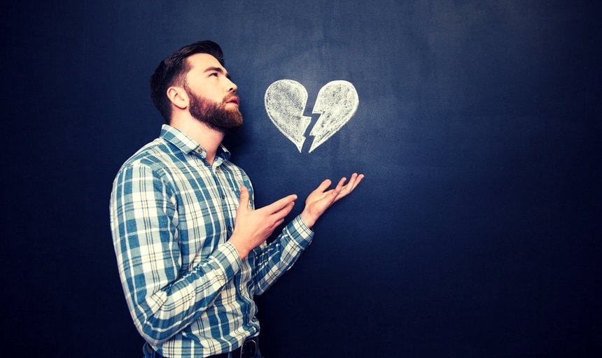 Man with broken heart looking to the sky