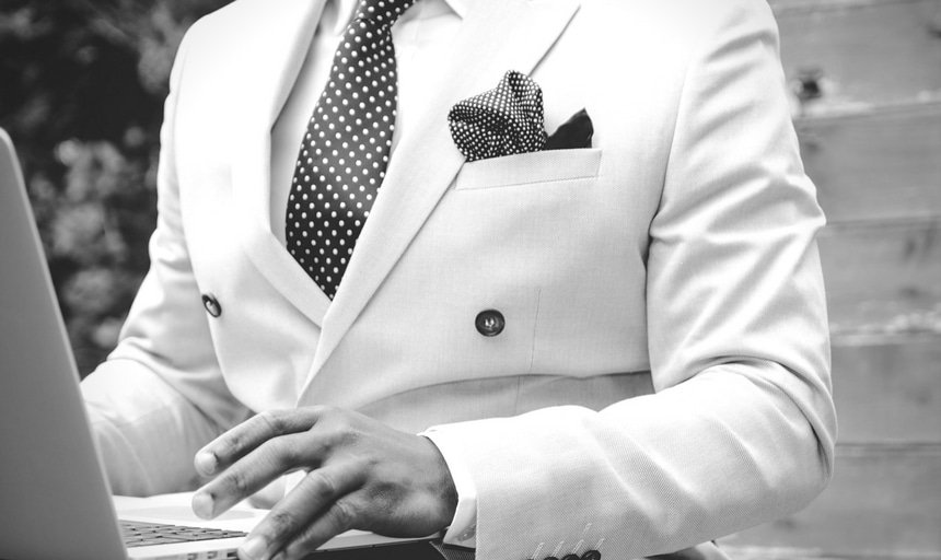 Man with pocket square and polka dot tie