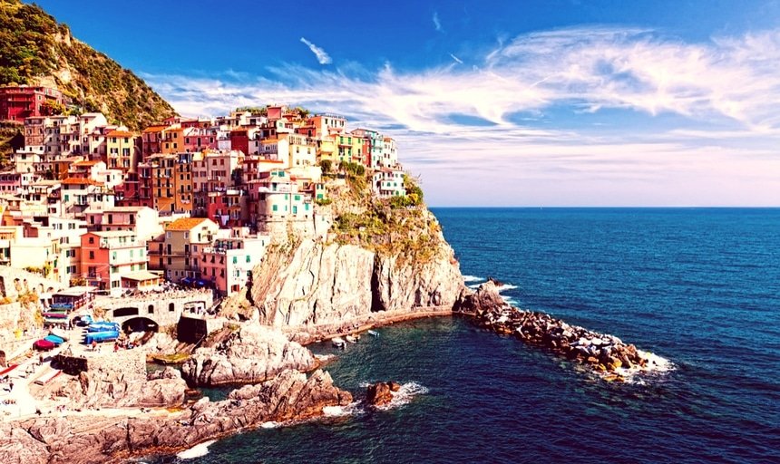 Manarola village on cliff rocks and sea at sunset., Seascape in Five lands, Cinque Terre National Park, Liguria Italy Europe