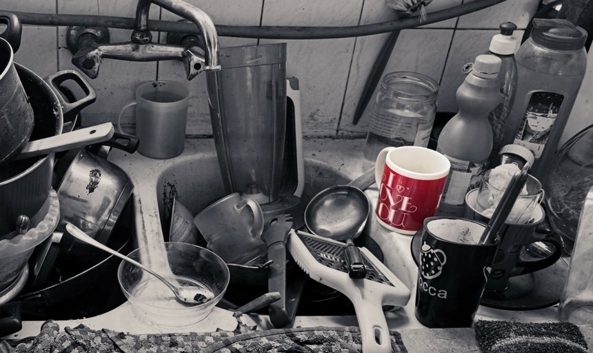 Messy kitchen with I Love You Mug