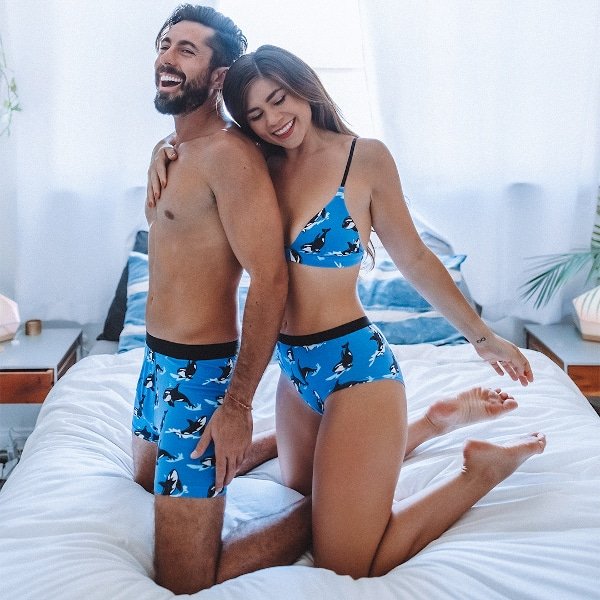 MeUndies couple in bed wearing matching underwear