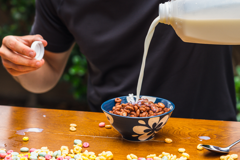 Milk splashing into Magic Spoon cereal