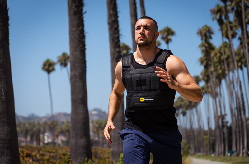 Model running in TRX KEVLAR WEIGHT VEST 1