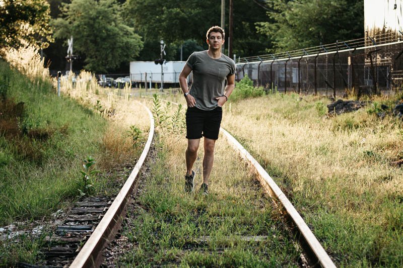 model walking toward camera wearing no swear duer performance denim jeans