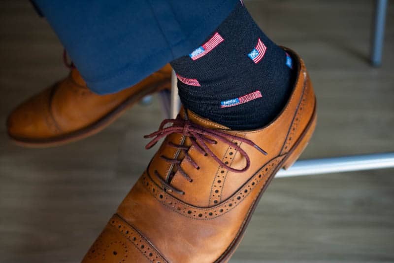 model wearing american flag socks blue tone