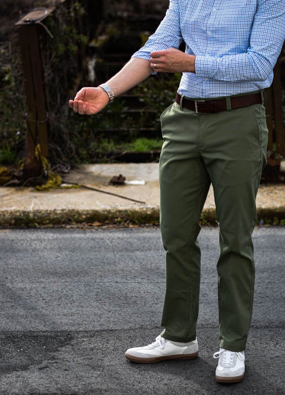 model wearing ascneder chinos and meridian dress shirt rolling sleeve