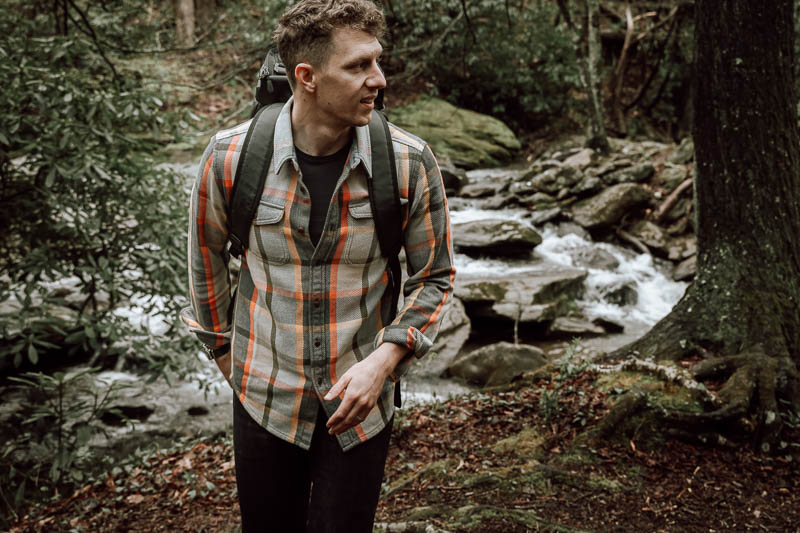 Db Bags Review: Adventure Awaits 4 model wearing Db Bags 30L hugger