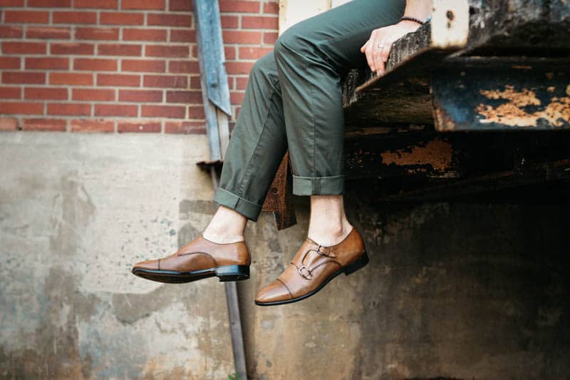 model wearing mgemi tommasso double monk strap shoes feet dangling