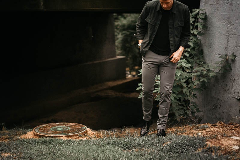 model wearing rhone commuter pants grey