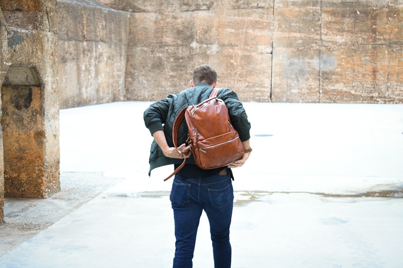 Modern made man leatherbackpack puton