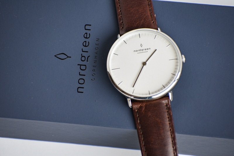 Nordgreen Native white dial against blue packaging