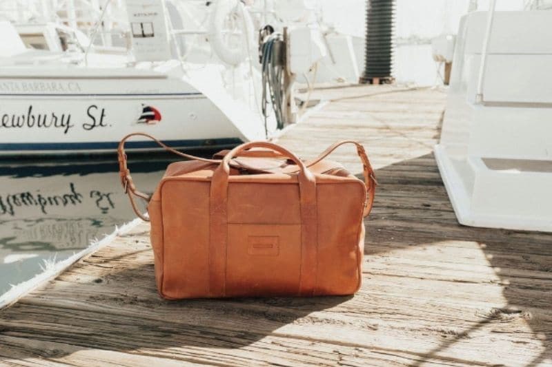 Parker Clay Montecito Weekender bag leather on boating dock