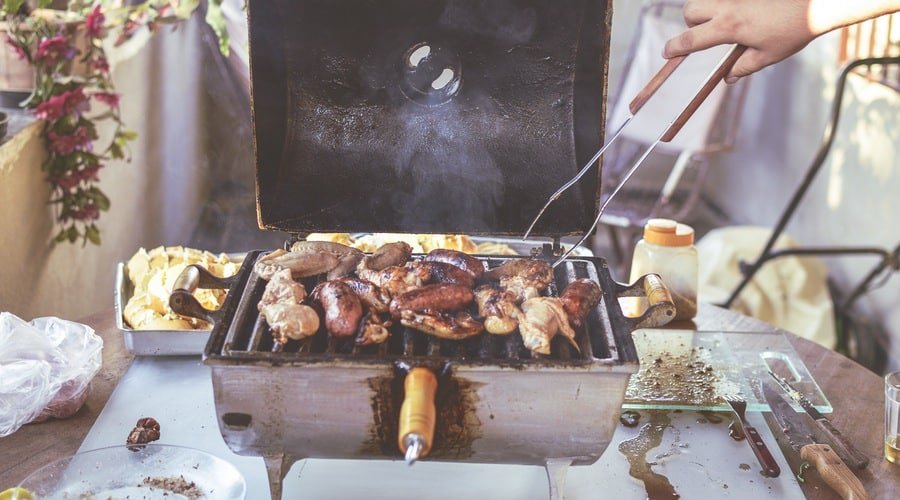 Grill with meat cooking