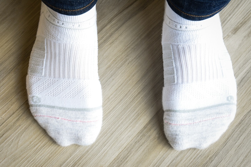 side by side comparison strideline right and left sock detail venting