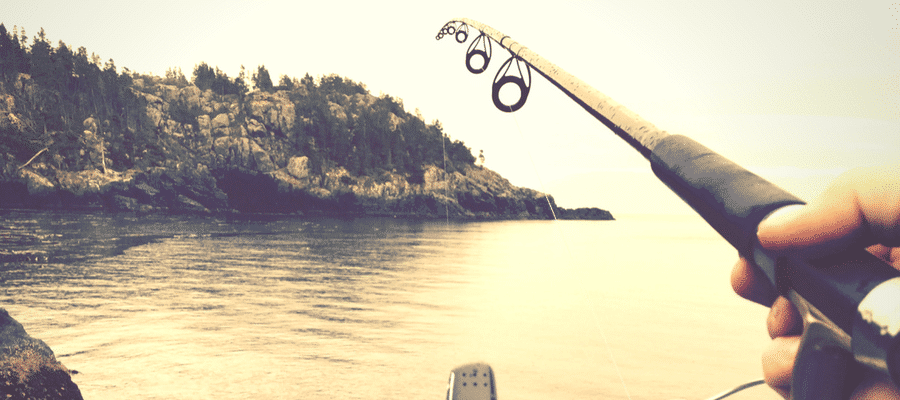 Fishing in lake from view of fisherman