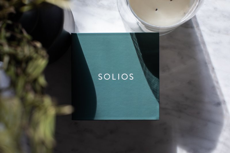 Solios packaging on marble table landscape