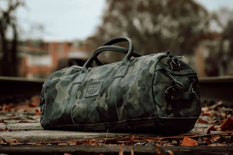 Tobacco Motorwear camo duffel on ground